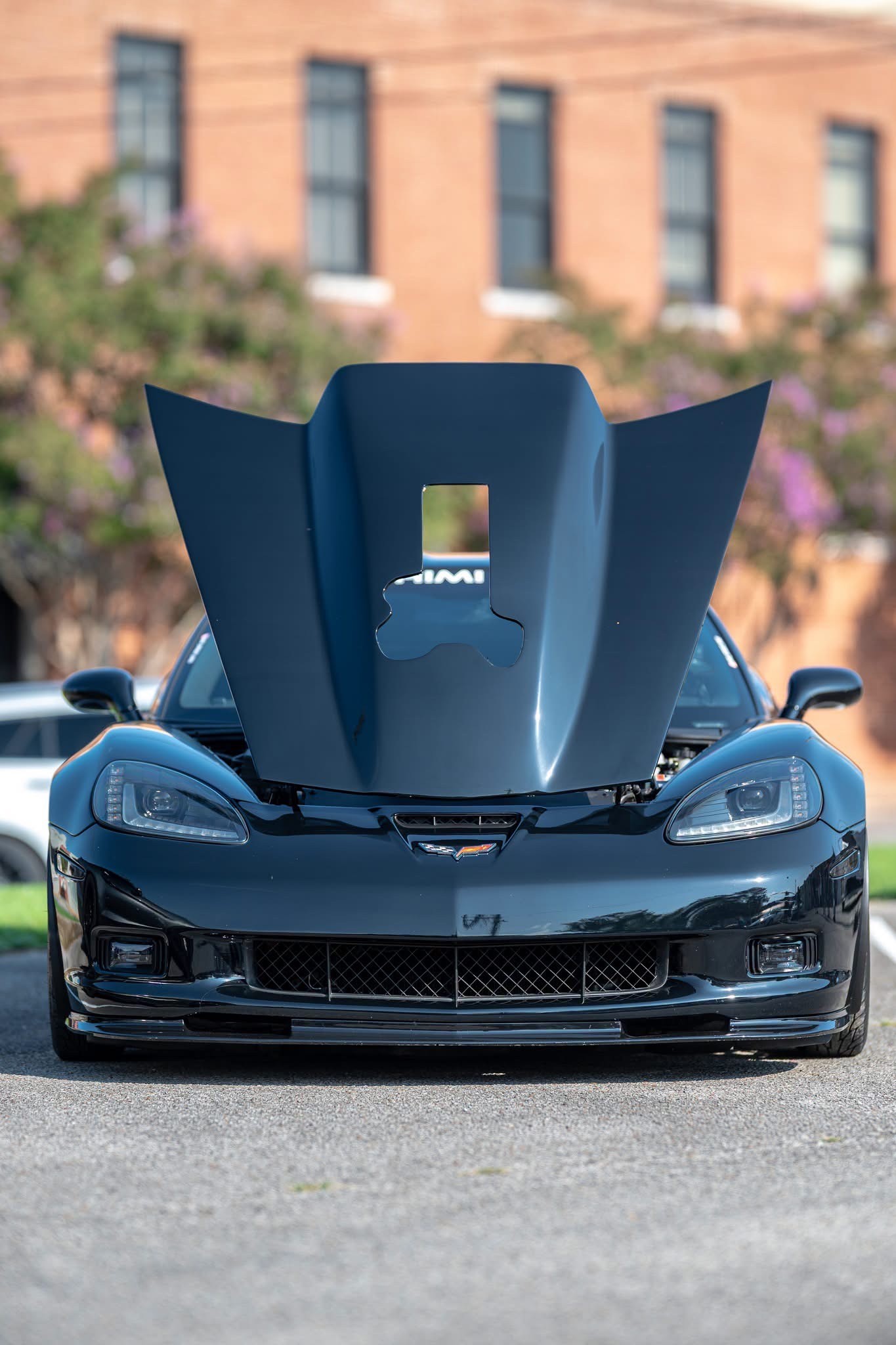 Roger Riddle’s personal Corvette with the hood raised